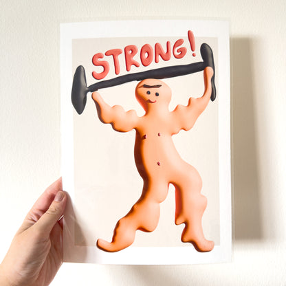 Art print with a cartoon character lifting weights and the word 'STRONG!' on a plain background